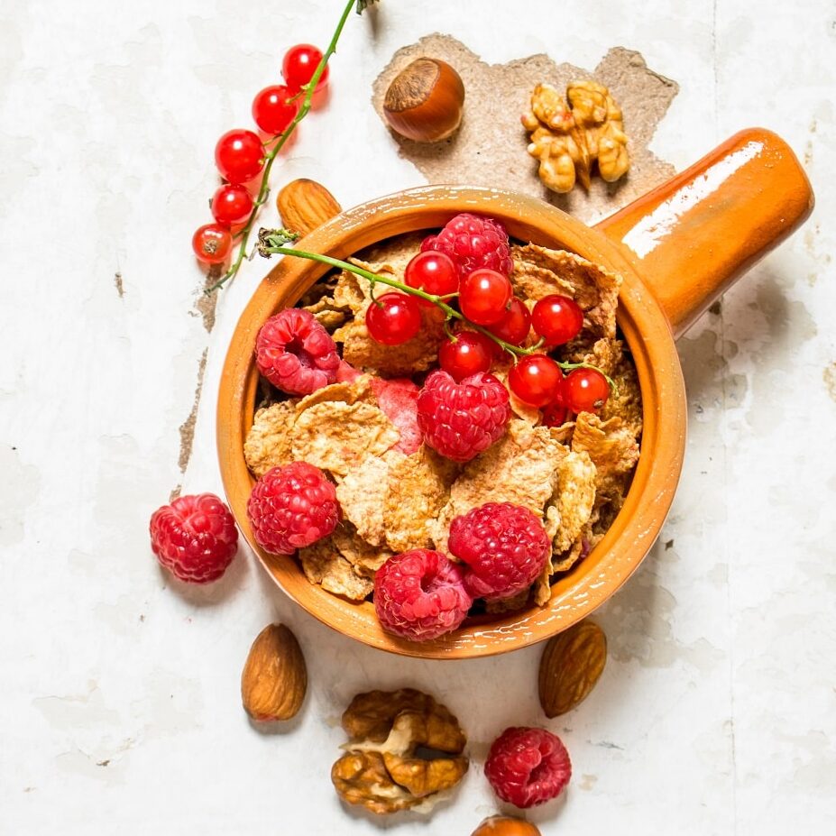 fitness-food-muesli-with-ripe-raspberries-and-nut-2021-09-03-10-17-10-utc-min.jpg